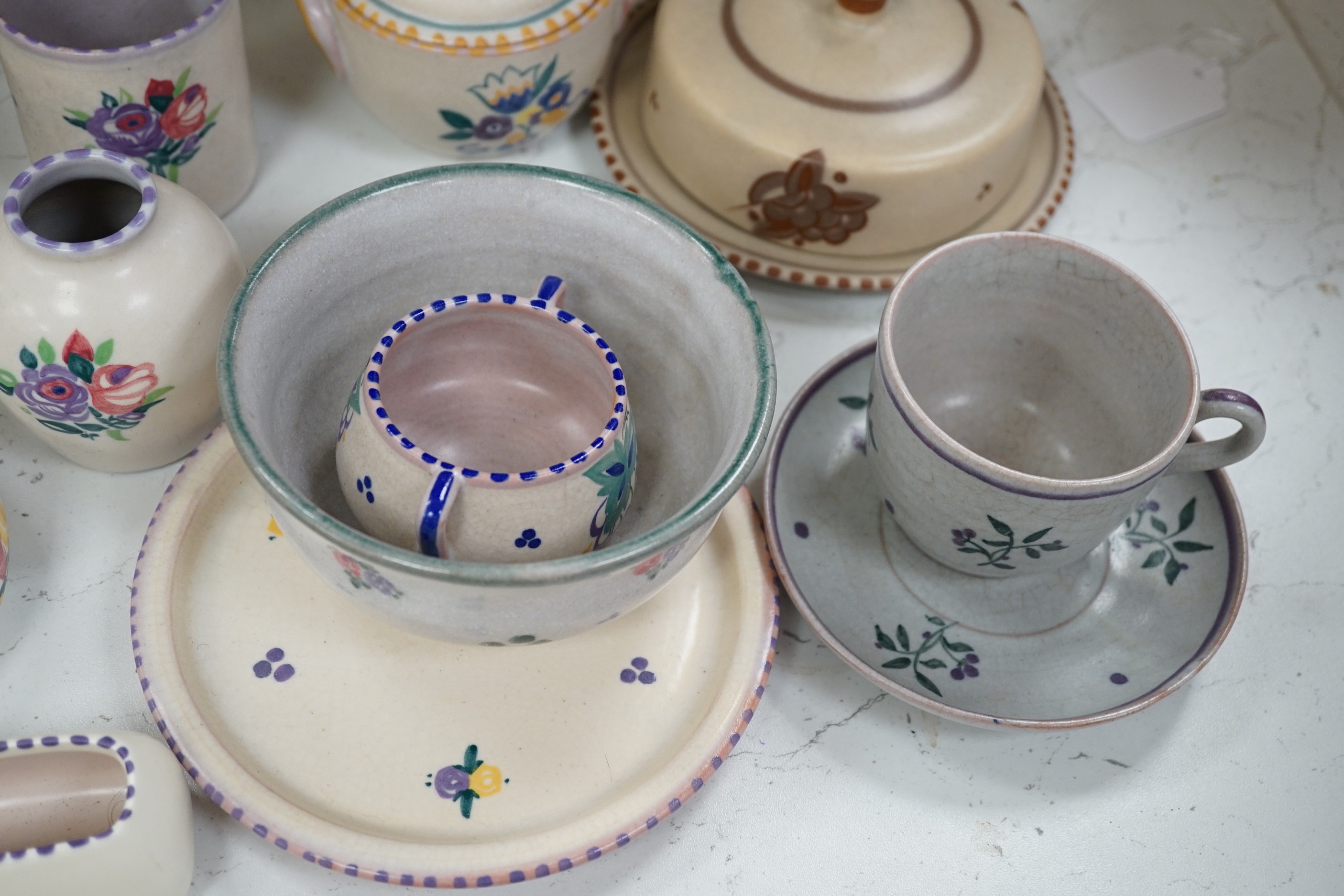 A large collection of mixed Poole pottery, mostly from 1920's, including a pale turquoise glazed 503 shape vase, tallest 26cms high